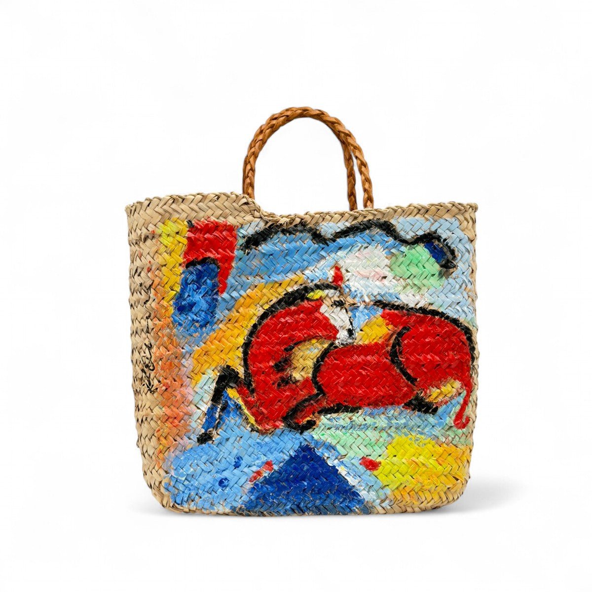 Dettaglio dei manici in pelle e della paglia intrecciata della borsa Forte dei Marmi.