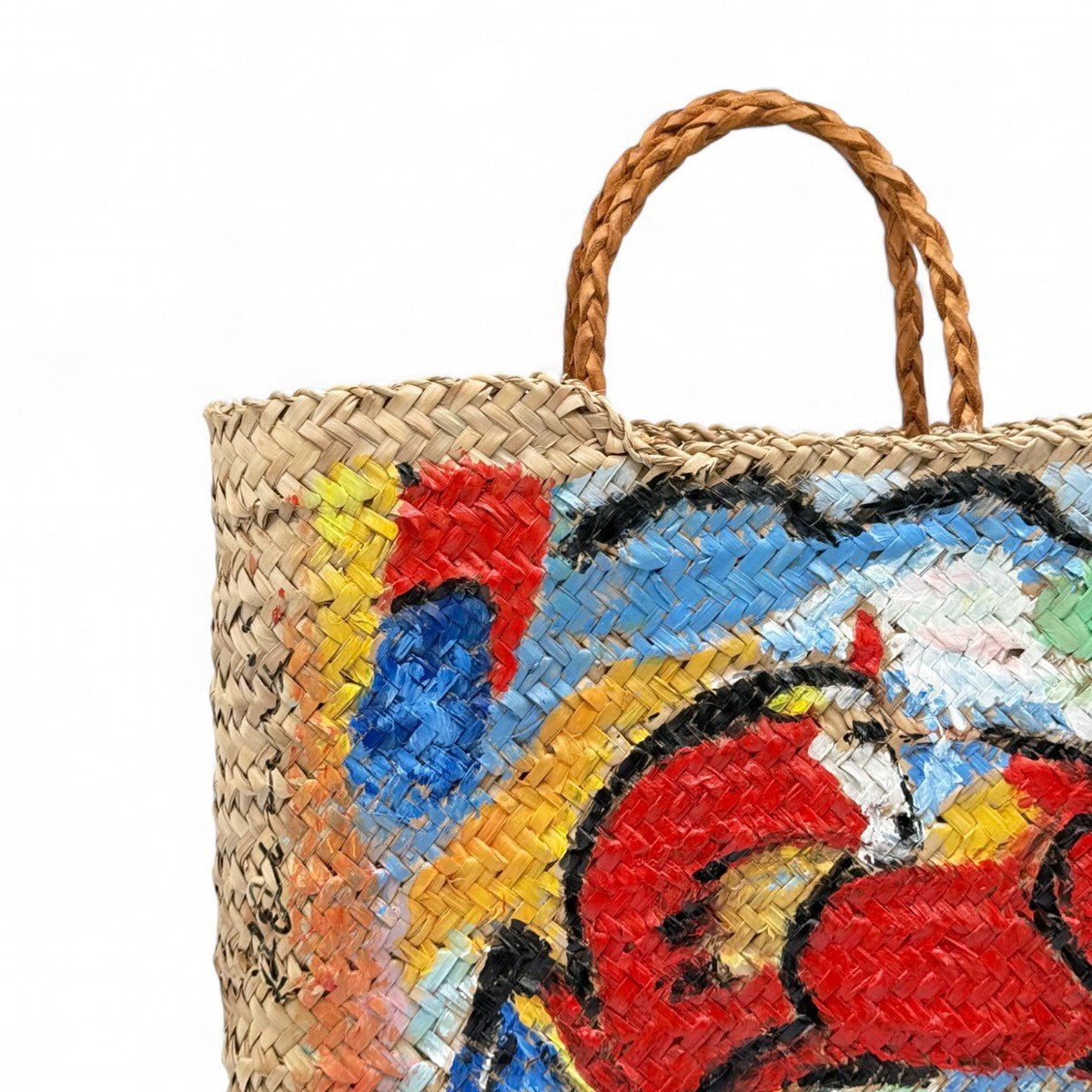 Profilo della borsa in paglia Forte dei Marmi che ne mostra la forma strutturata.