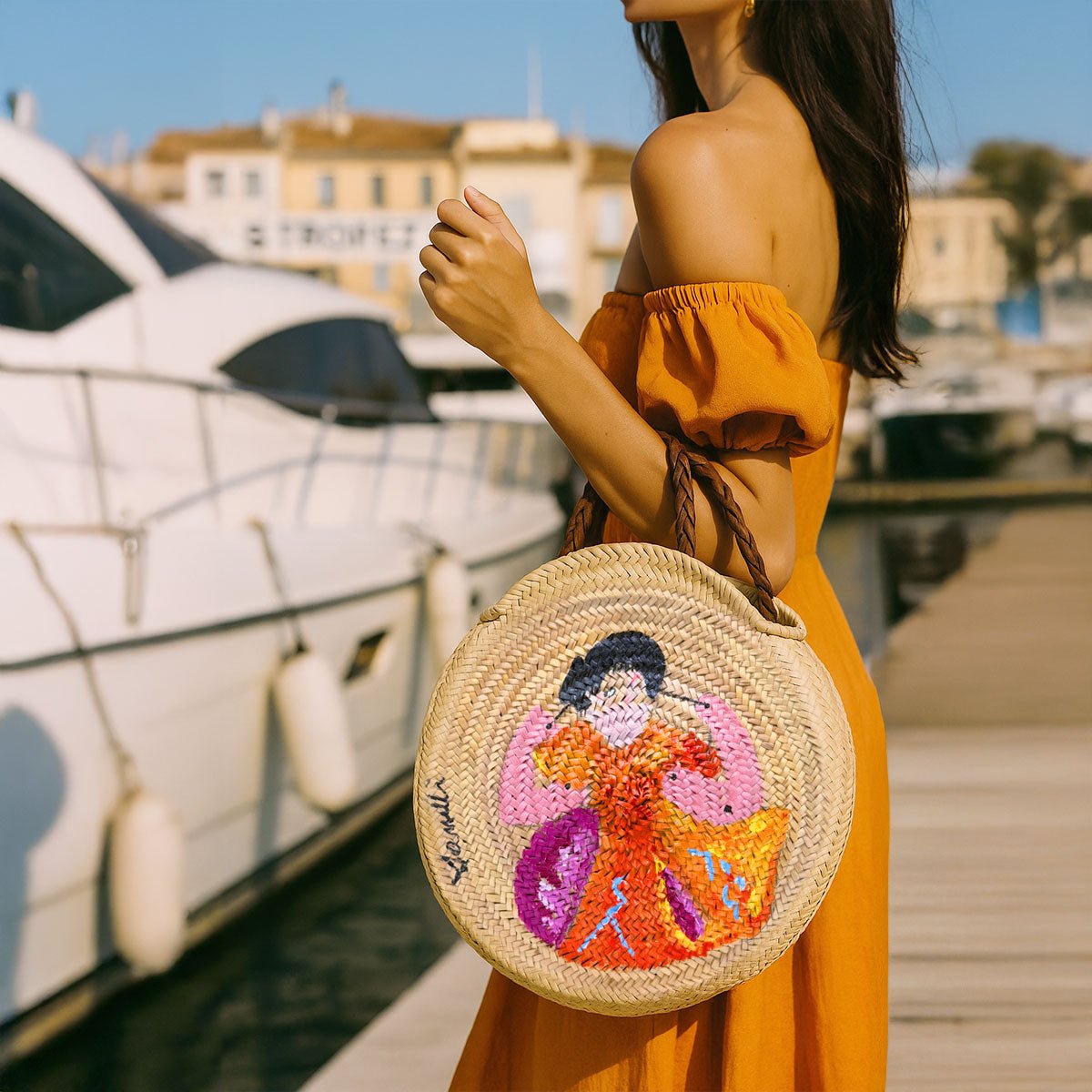 Borsa in paglia Saint Tropez La Danseuse, pezzo unico rotondo, dipinto a mano da Carlo.