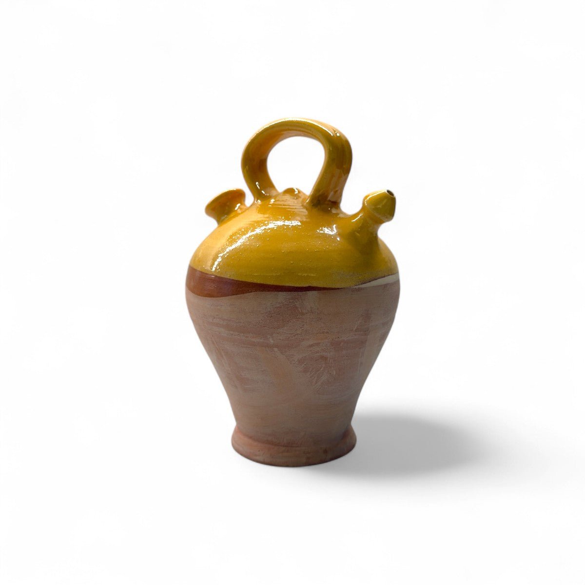 Profilo del botijo vintage spagnolo che ne mostra la forma archetipica e il manico.