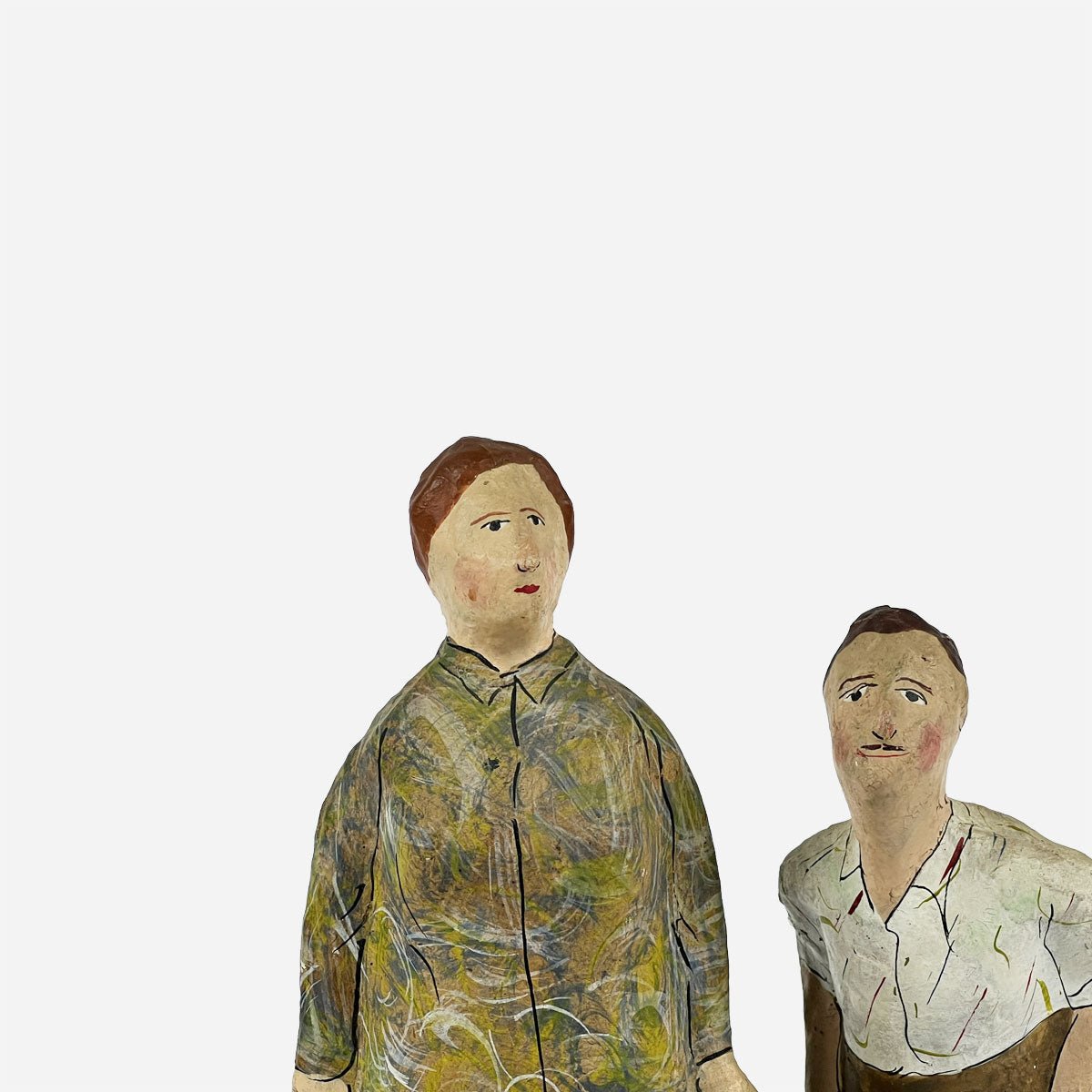 Profilo delle statuine in cartapesta che ne mostra la tridimensionalità e la posa.