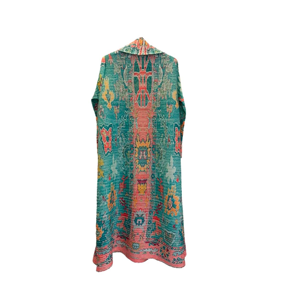 Il kimono Turquoise Caravan mostrato con la sua dust bag firmata Vicode, ideale per i viaggi.