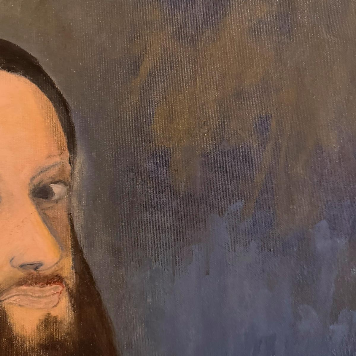 Vista angolata del Quadro Uomo in Blu che mostra la cornice in legno bianco inclusa.