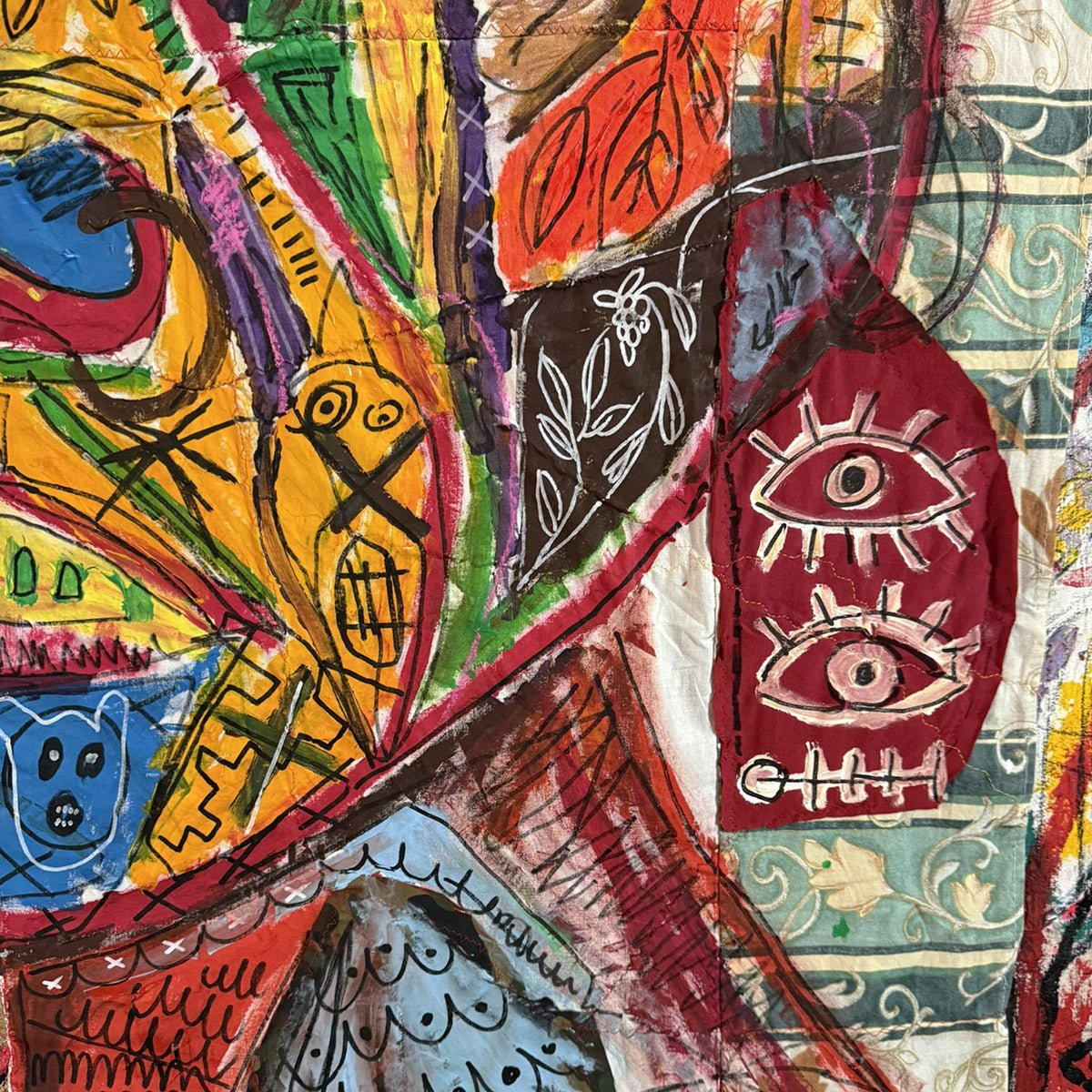 Il Quadro Maschera Indiana di Massimiliano Precisi esposto su una parete bianca.