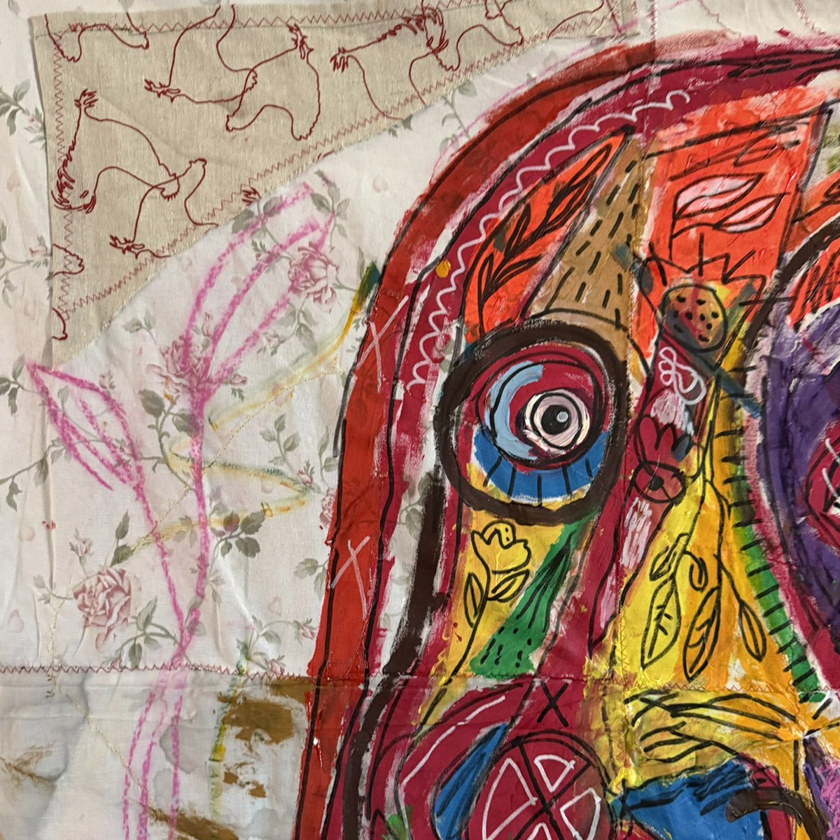 Particolare dei colori accesi e delle pennellate audaci sul volto della Maschera Indiana.