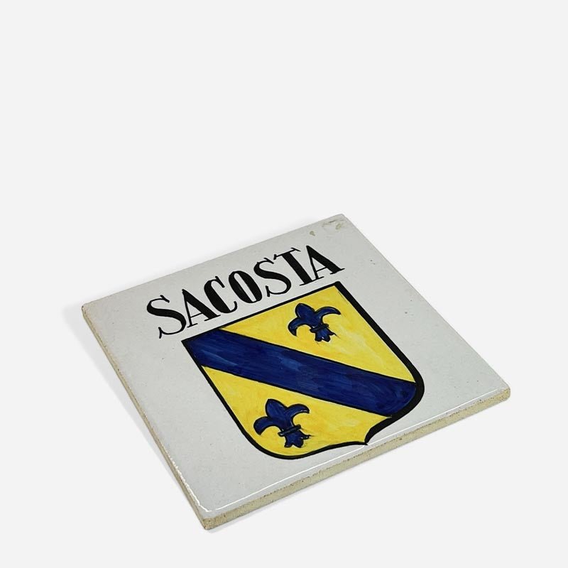 Composizione a parete di diverse Mattonelle Enrique Yuste che creano un mosaico decorativo.