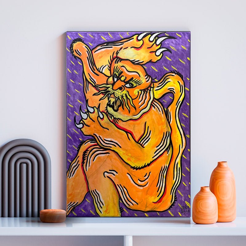 Il Quadro Esplosione della Tigre appeso a una parete di mattoni in un loft urbano.