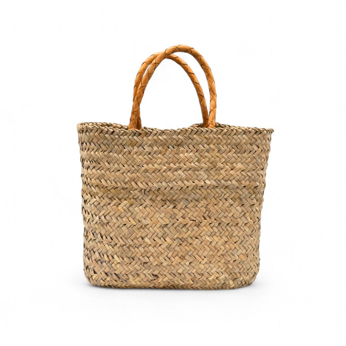 Dettaglio della firma dell'artista Carlo sul dipinto della borsa in paglia.