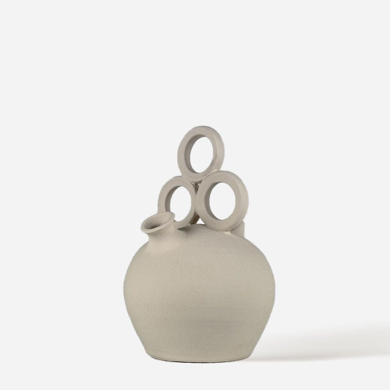 Il Vaso Luz de Fiesta con un allegro mazzo di fiori di campo colorati.