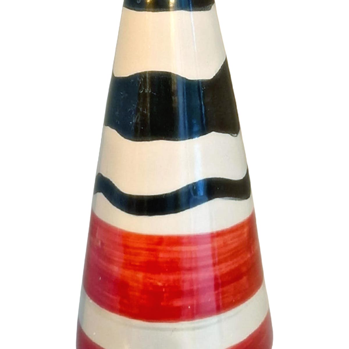 Il vaso Sipario Audace in una libreria eclettica, come punto focale colorato.