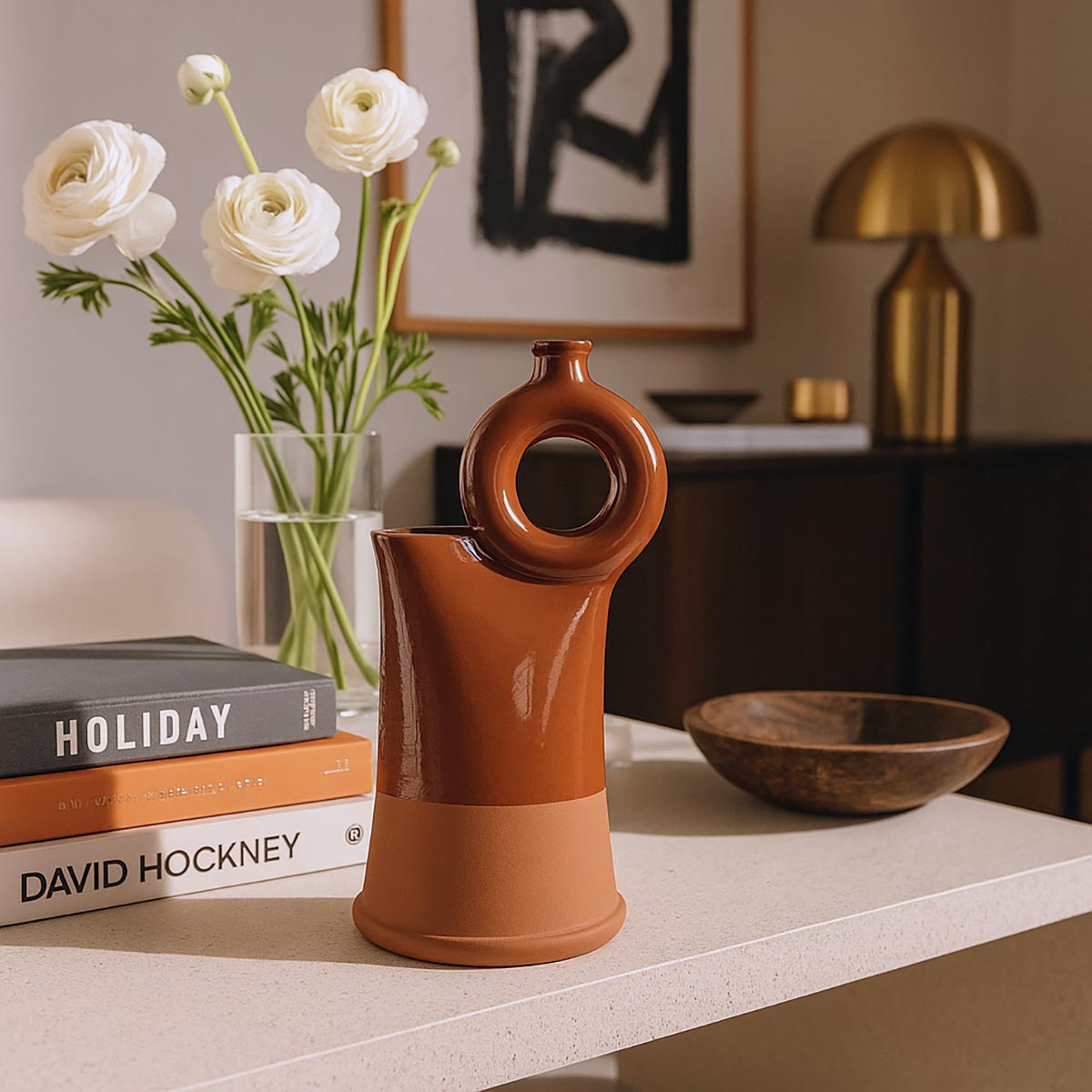 Vaso Spagnolo Sol De Fuego, scultura circolare in ceramica di un vibrante colore rosso.