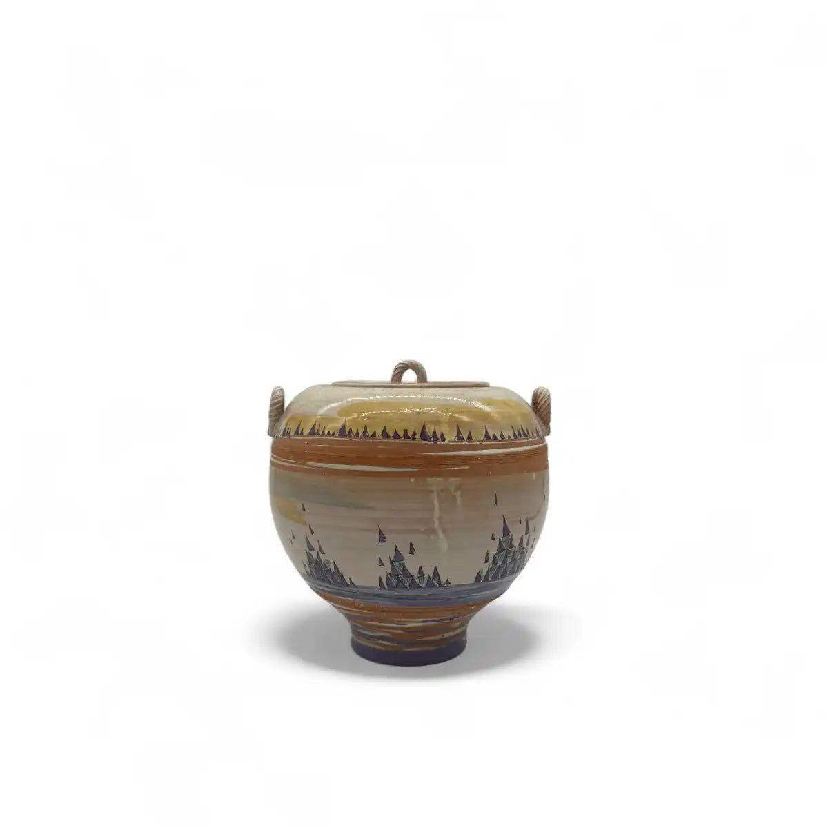 Vento di Lilla in un interno in stile bohémien, accanto a piante e tessuti naturali.