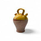 Profilo del botijo vintage spagnolo che ne mostra la forma archetipica e il manico.