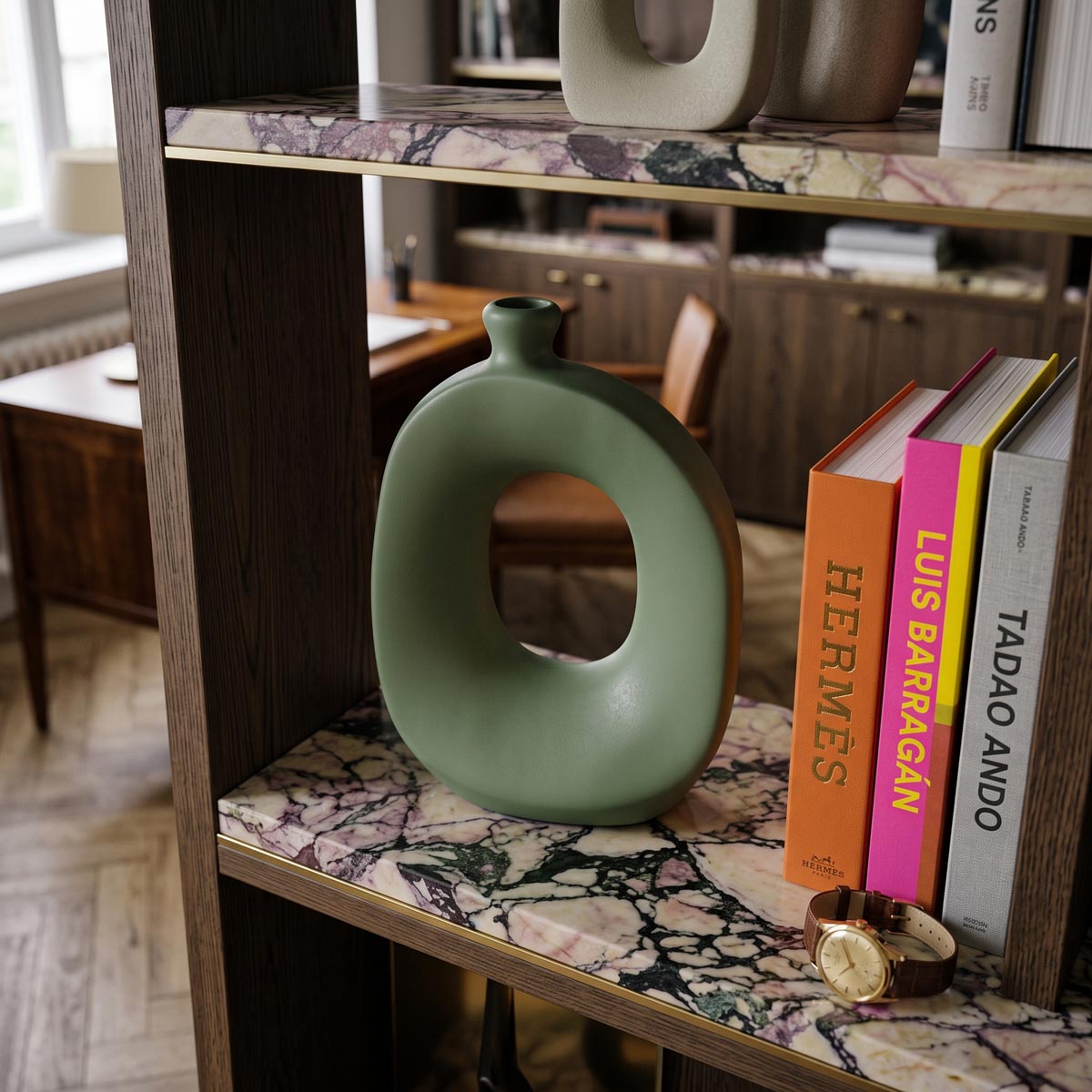 Vaso di design in ceramica verde Cordiale inserito in un elegante ambiente living
