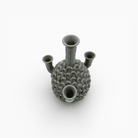 Oggetto d'arte ceramica texture imbricata riflessi luce