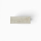 Matrice Ocra pezzo unico in ceramica smaltata con geometrie astratte e aperture architettoniche