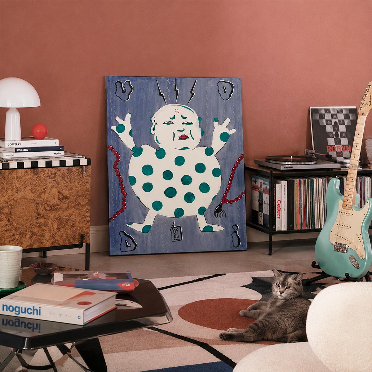 Quadro Buddha, dipinto originale dell'artista Emiliano dalle Piagge (Uodi) in uno spazio di design stile sottsass