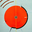 Sfere colorate rosso, rosa e arancio che emettono frequenze visive concentriche.