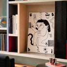 Quadro Monocromatico Opus #6 di Uodi ambientato in una zona living moderna di design stile sottsass
