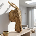 La Siesta del Fauno esposta come pezzo d'arte unico sulla parete di uno studio.