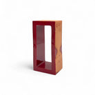 Vista di tre quarti della scultura Passaggio Rubino, che ne evidenzia la forma pura.