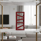 La scultura in terracotta rossa Ombra Vermiglia esposta su una mensola in legno scuro.