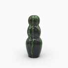 Scultura in ceramica forma organica con striature verticali